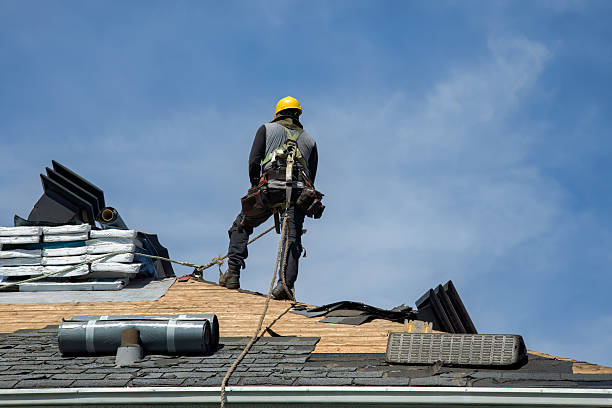 Professional Roof Replacement technician working in Laurel, IN
